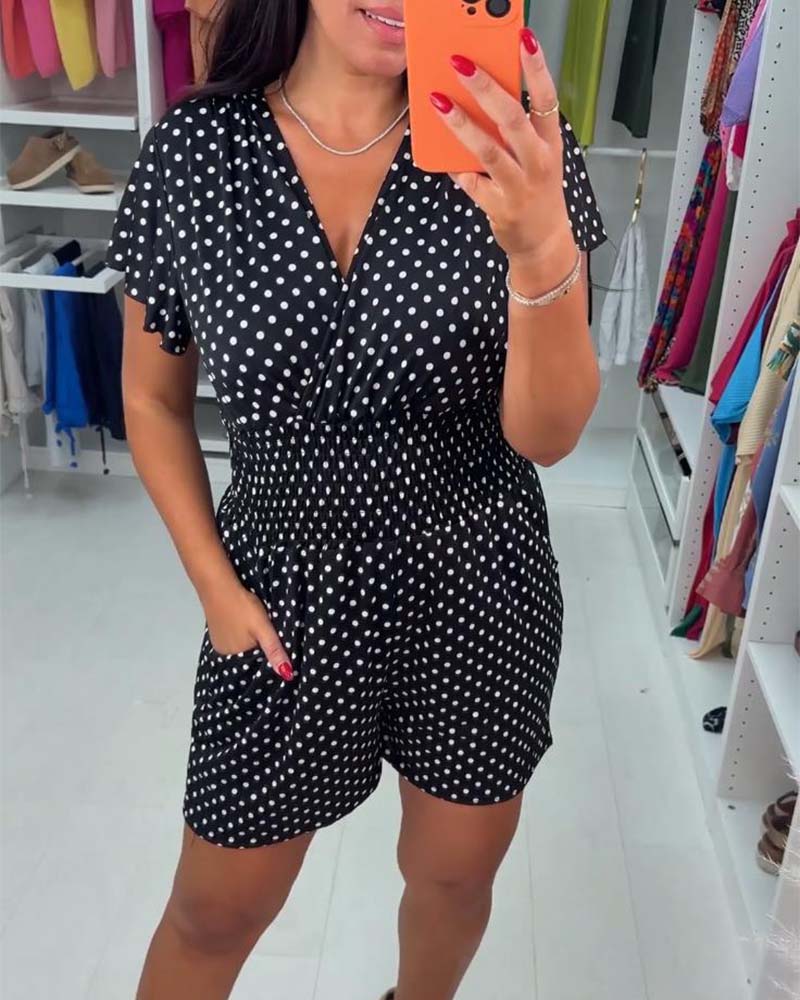 Stina | Afslappet sommer-jumpsuit med korte ærmer, prikket print og V-udskæring