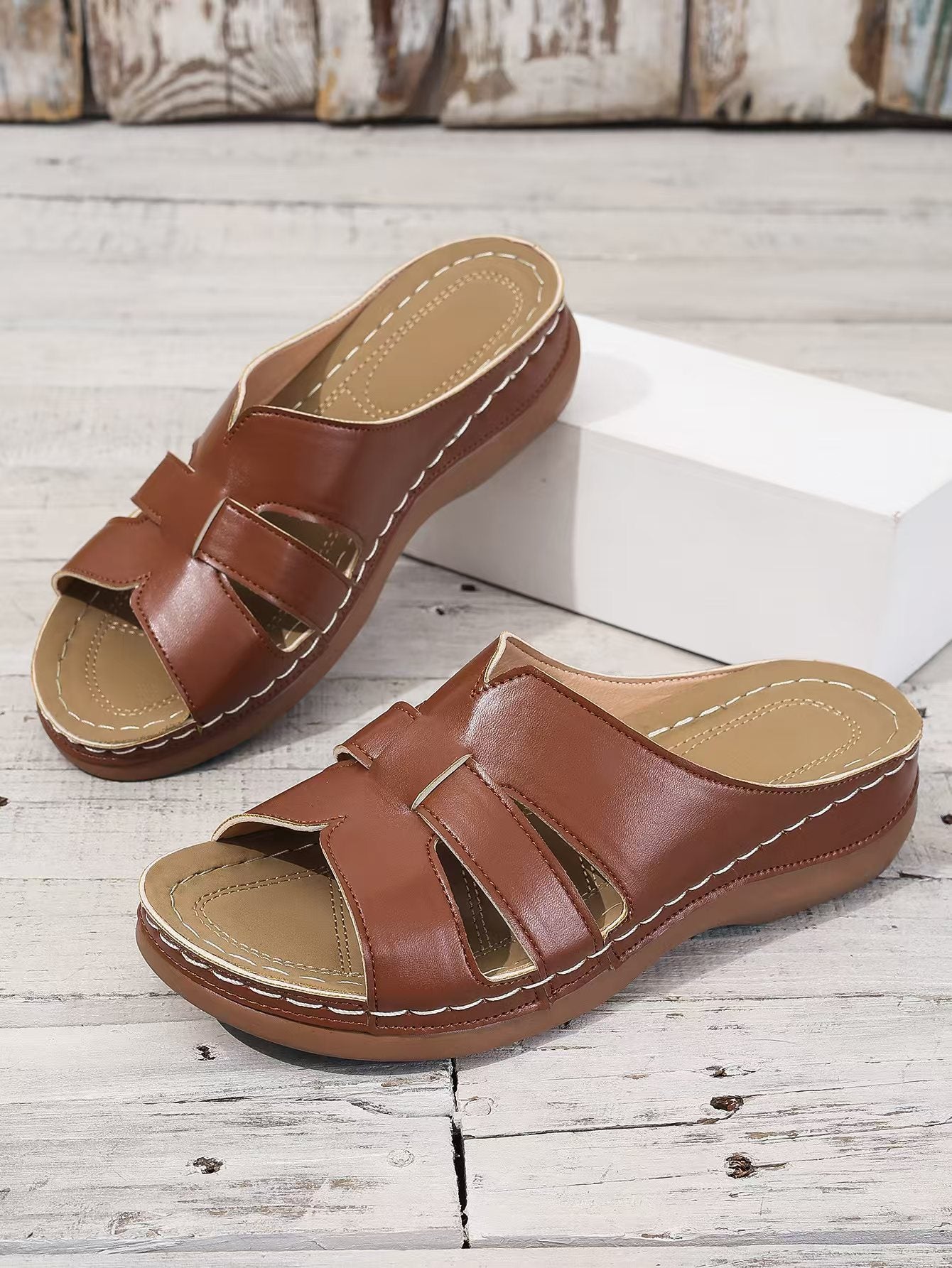 Cristel | Leather open-toe slippers for women