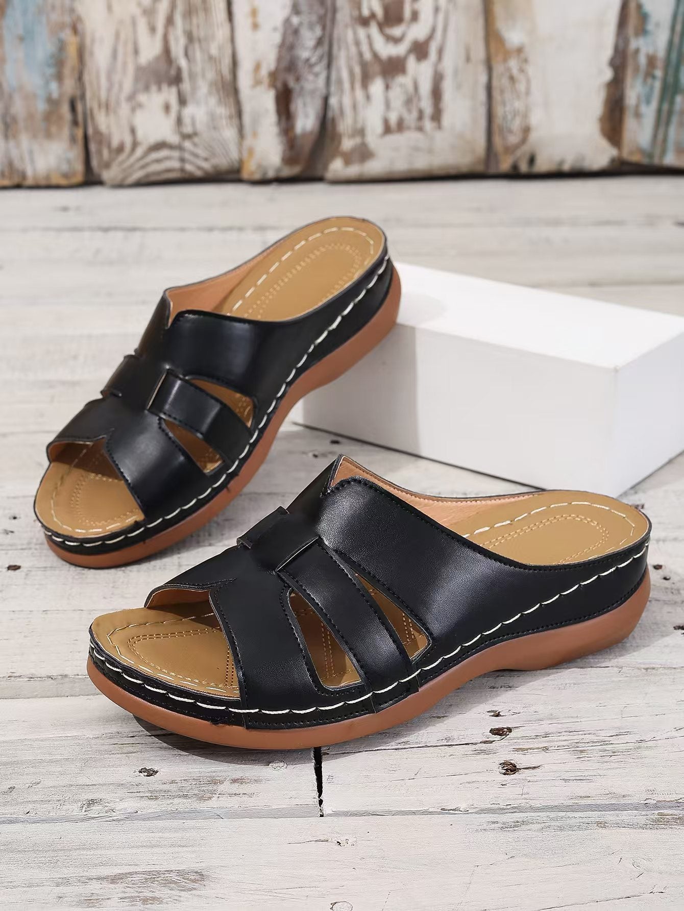 Cristel | Leather open-toe slippers for women