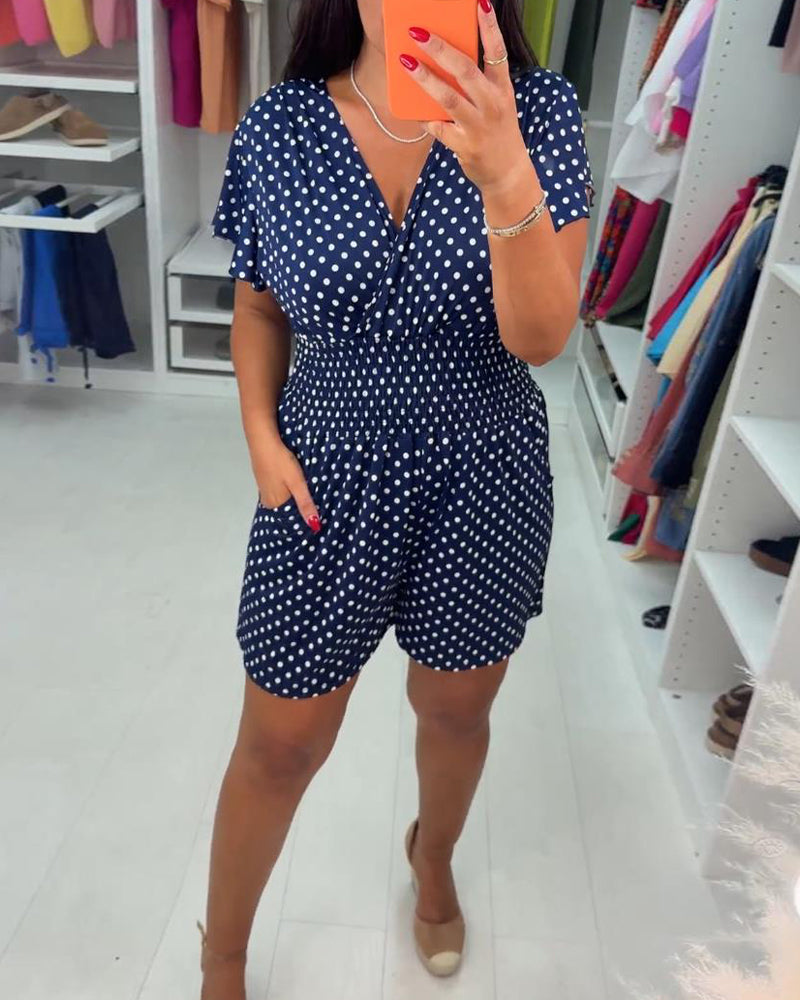 Stina | Afslappet sommer-jumpsuit med korte ærmer, prikket print og V-udskæring