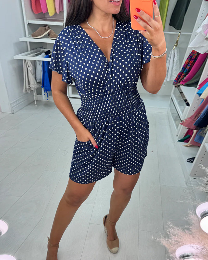 Stina | Afslappet sommer-jumpsuit med korte ærmer, prikket print og V-udskæring