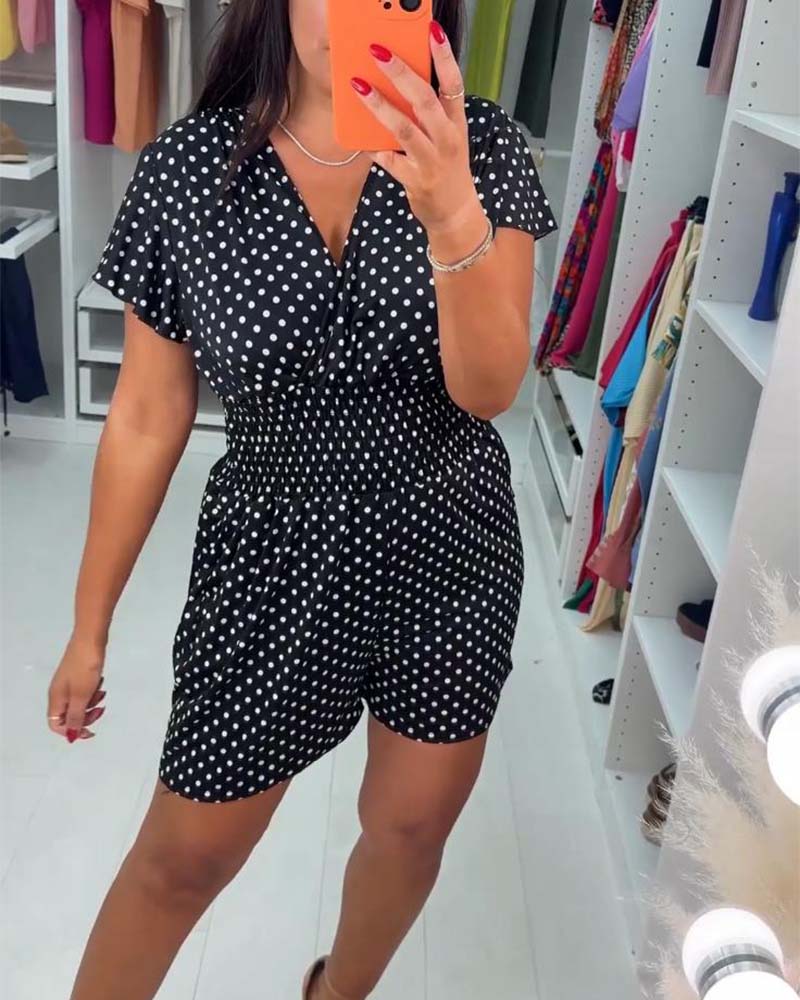 Stina | Afslappet sommer-jumpsuit med korte ærmer, prikket print og V-udskæring