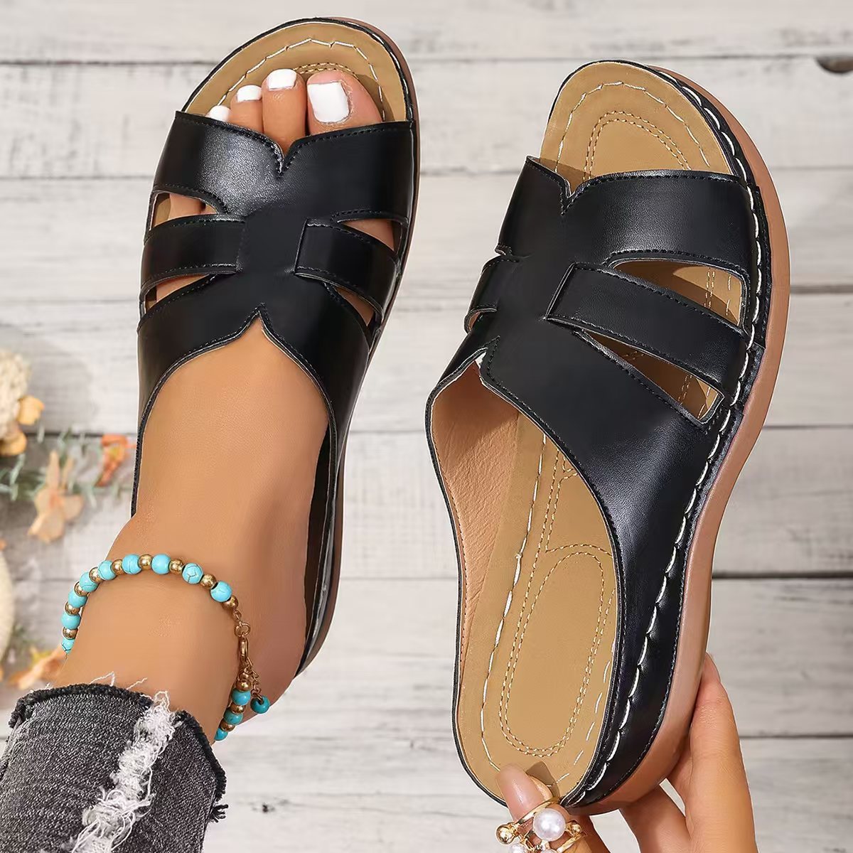 Cristel | Leather open-toe slippers for women
